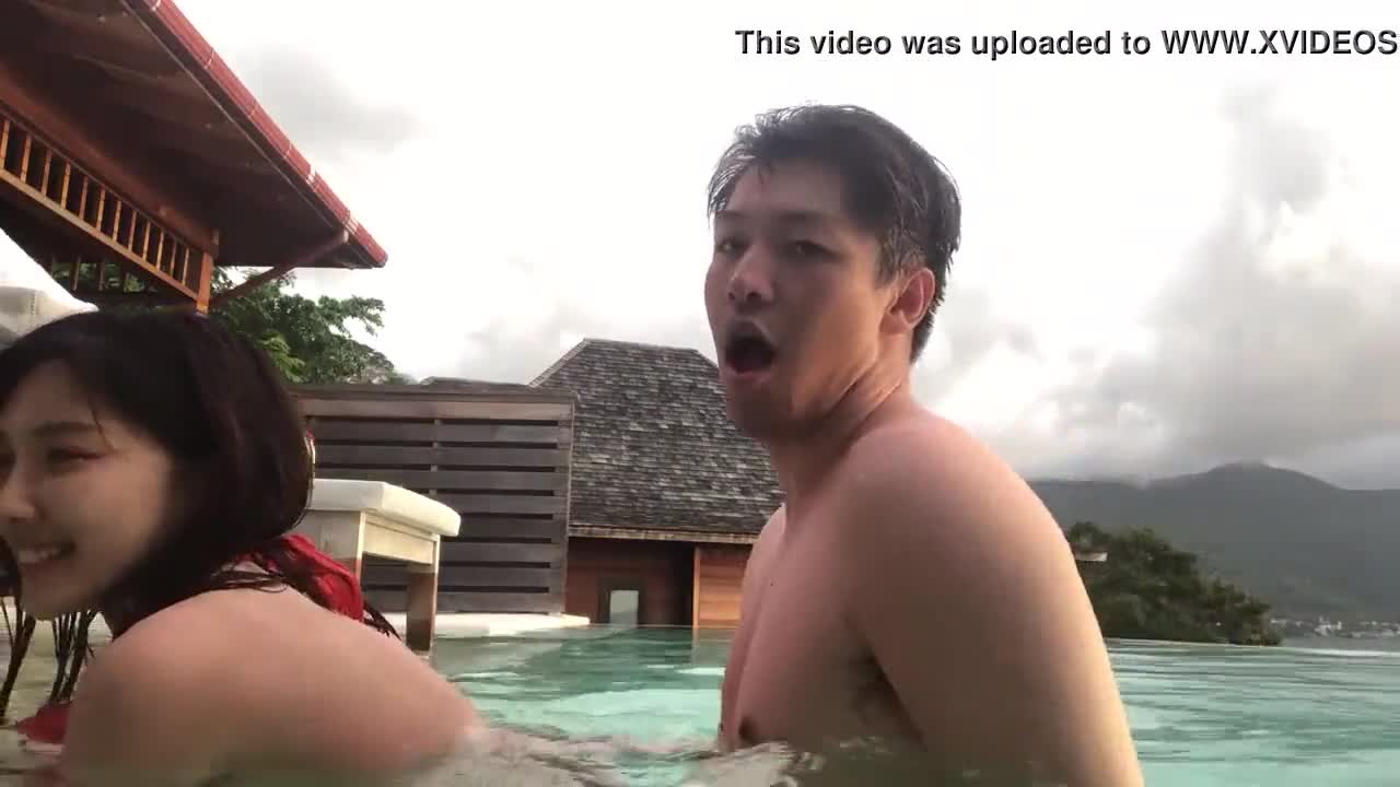 Asian couple inside swimming pool - Porn - EroMe